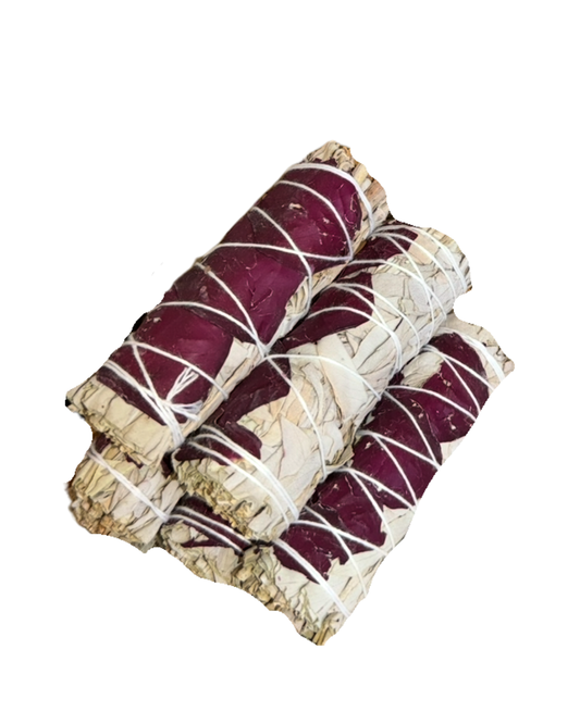 Five bundles of sage smudge sticks with white string, showing off-white sage leaves and deep red/ purple dried rose petals, isolated on a white background.